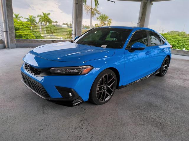 Photo of 2022 Boost Blue Pearl Honda Civic