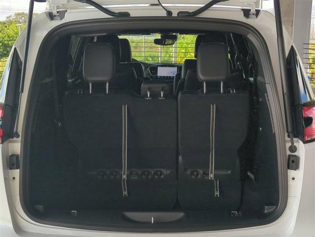 Photo of 2025 Bright White Clearcoat Chrysler Pacifica Hybrid