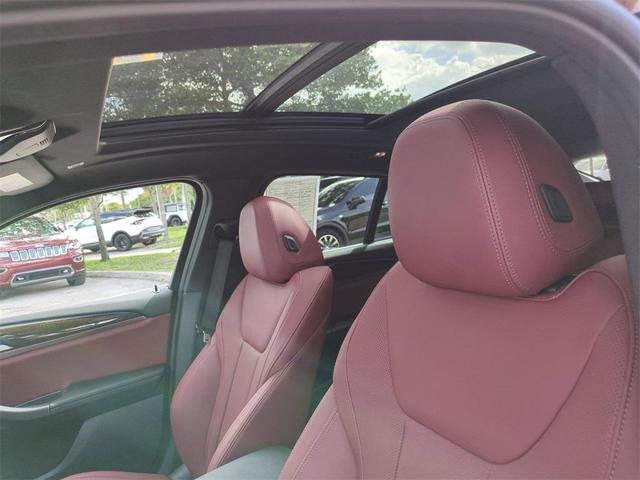 Photo of 2025 Black Sapphire Metallic BMW X4