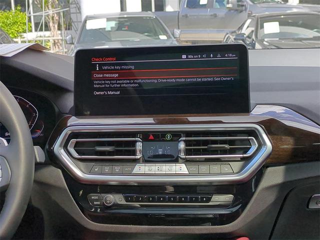 Photo of 2025 Black Sapphire Metallic BMW X4