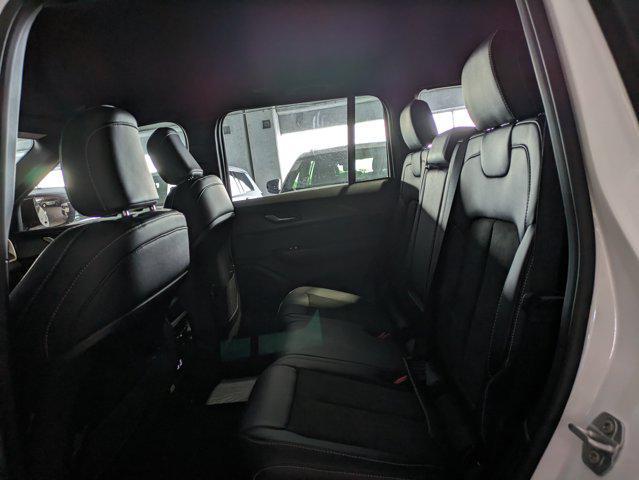 Photo of 2025 Bright White Clearcoat Jeep Grand Cherokee