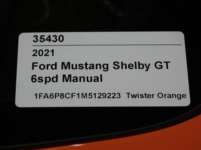 Photo of 2021 yellow Ford Mustang