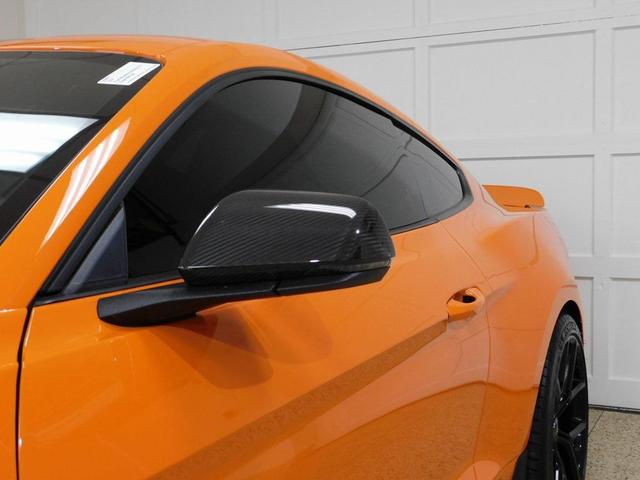 Photo of 2021 yellow Ford Mustang