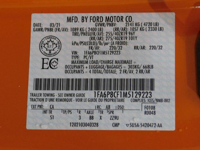 Photo of 2021 yellow Ford Mustang