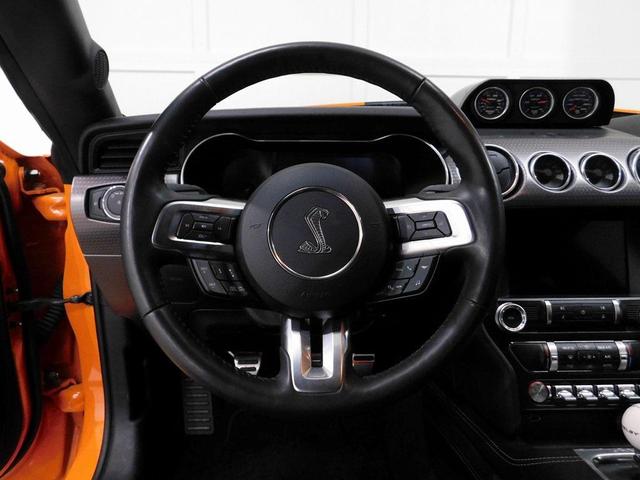 Photo of 2021 yellow Ford Mustang