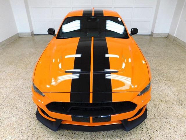 Photo of 2021 yellow Ford Mustang