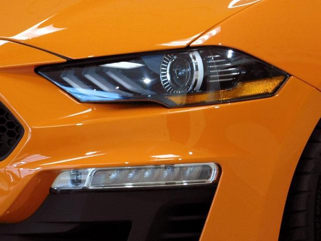 Photo of 2021 yellow Ford Mustang