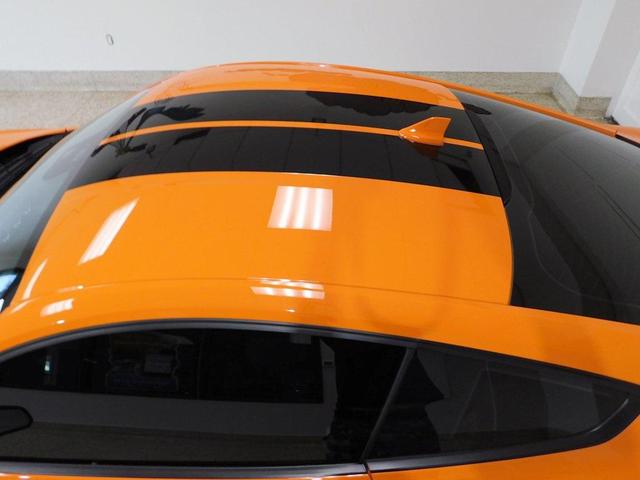 Photo of 2021 yellow Ford Mustang