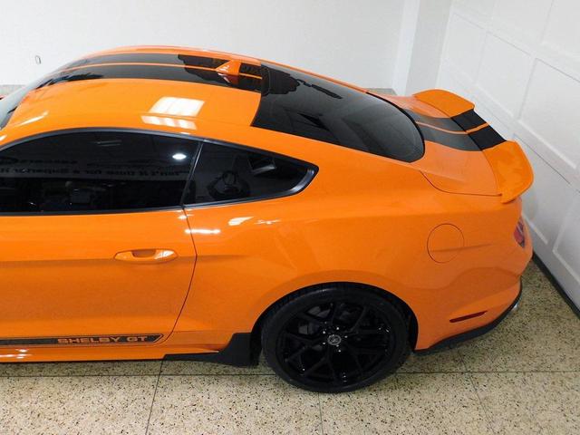 Photo of 2021 yellow Ford Mustang