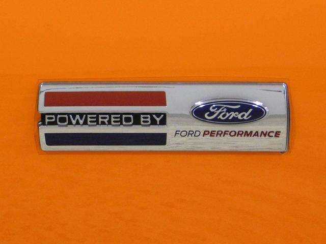 Photo of 2021 yellow Ford Mustang