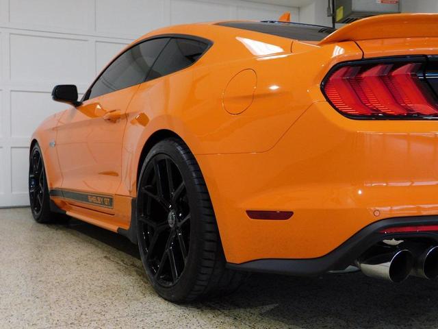 Photo of 2021 yellow Ford Mustang