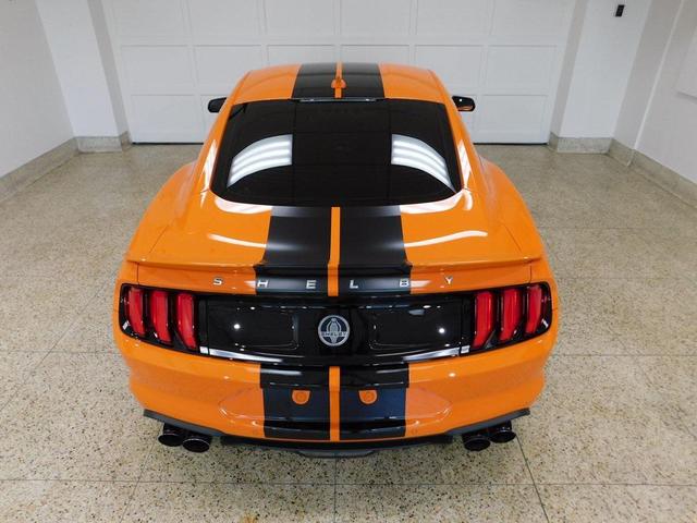 Photo of 2021 yellow Ford Mustang