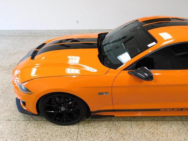 Photo of 2021 yellow Ford Mustang