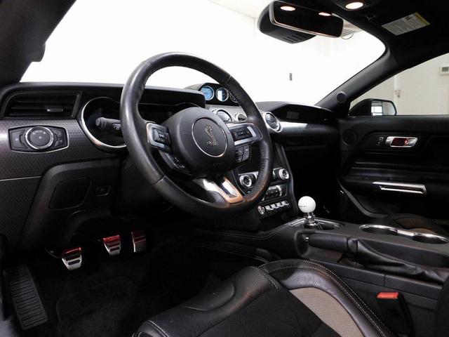Photo of 2021 yellow Ford Mustang