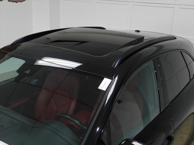 Photo of 2021 Jet Black Metallic Porsche Macan
