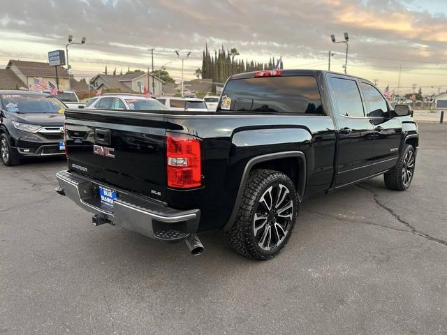Photo of 2015 Onyx Black GMC Sierra 1500