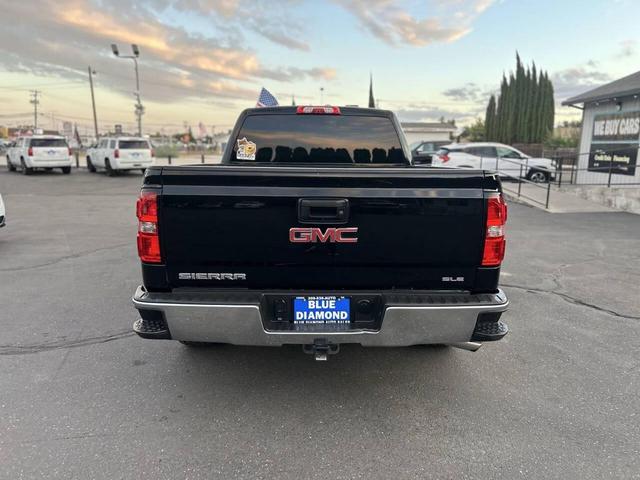 Photo of 2015 Onyx Black GMC Sierra 1500