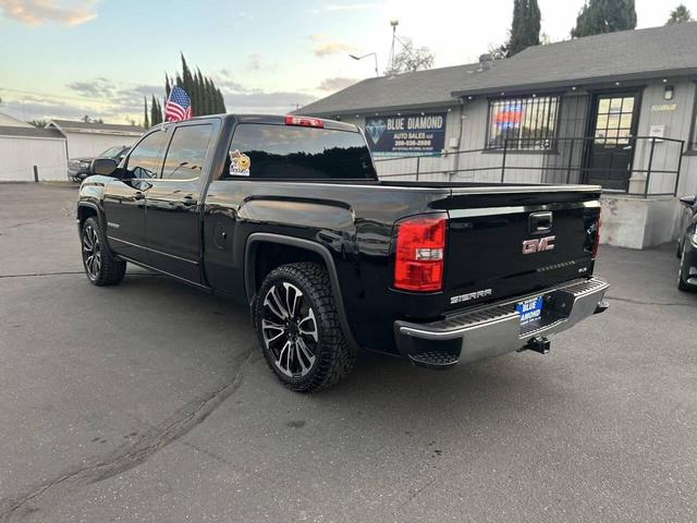 Photo of 2015 Onyx Black GMC Sierra 1500