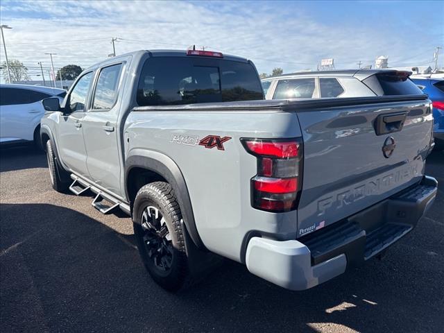 Photo of 2023 Boulder Gray Pearl Nissan Frontier
