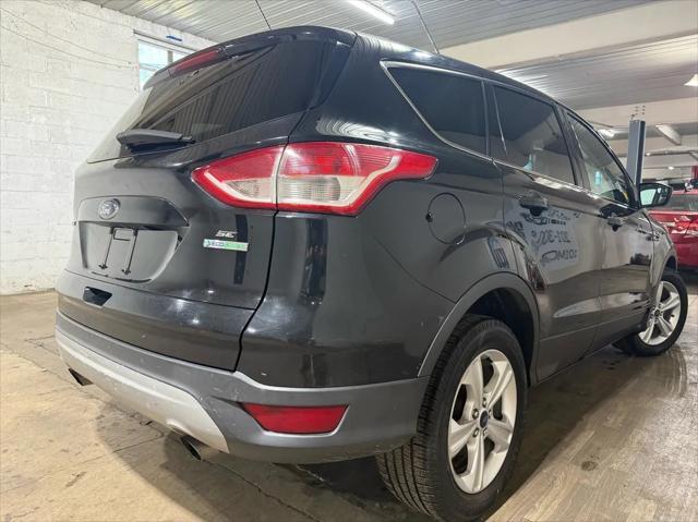 Photo of 2013 Black Ford Escape