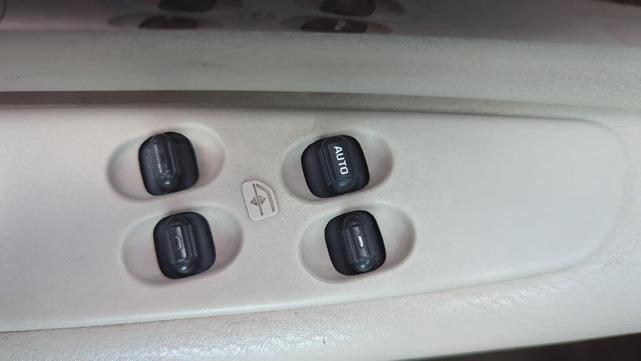 Photo of 2004 Satin Jade Pearlcoat Chrysler Sebring