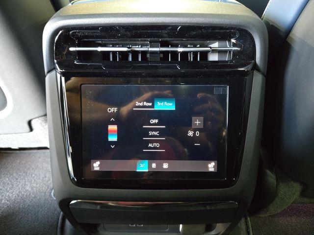 Photo of 2026 Vibrant White Cadillac Escalade IQ