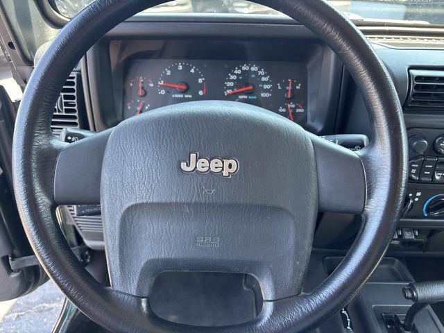 Photo of 2005 Moss Green Pearlcoat/Dark Green Hard Top Jeep Wrangler