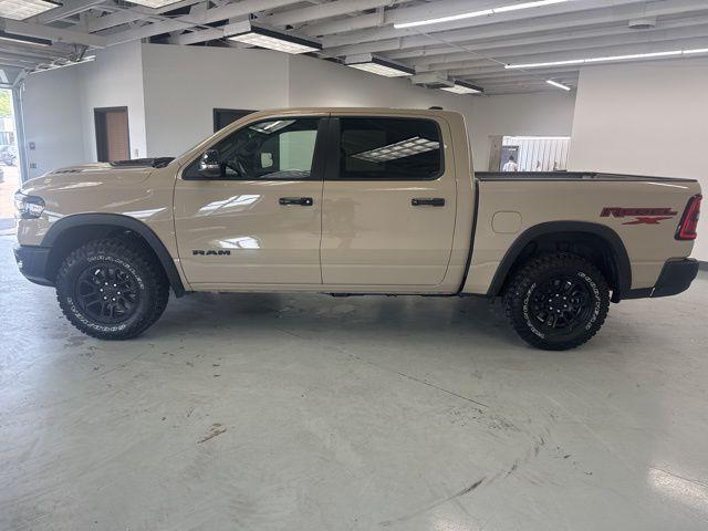 Photo of 2025 Mojave Sand Clearcoat RAM 1500