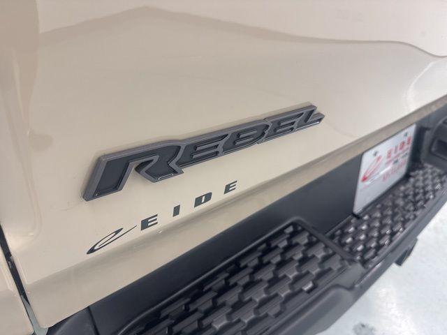Photo of 2025 Mojave Sand Clearcoat RAM 1500