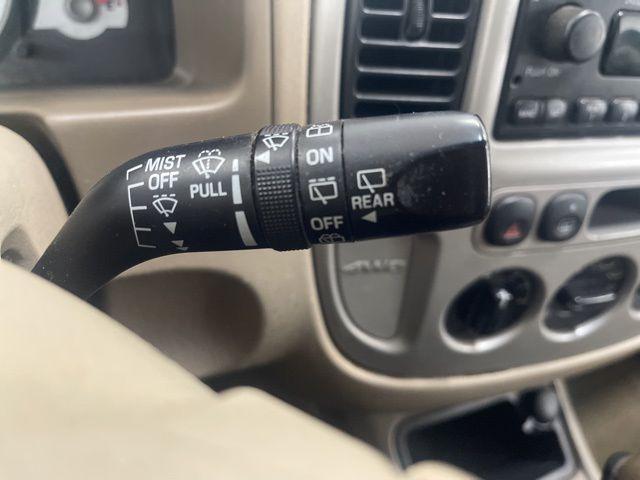 Photo of 2006 Blazing Copper Clearcoat Metallic Ford Escape
