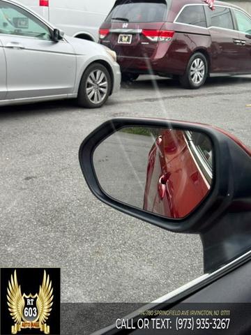 Photo of 2023 Supersonic Red Toyota Camry