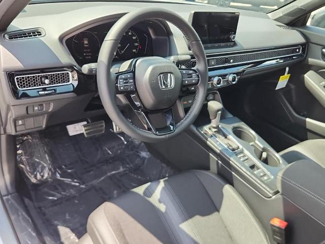 Photo of 2026 Solar Silver Metallic Honda Civic Hybrid