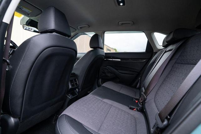 Photo of 2024 Blue / Black Kia Seltos