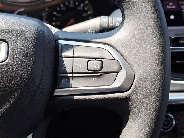 Photo of 2023 Sting-Gray Clearcoat Jeep Compass