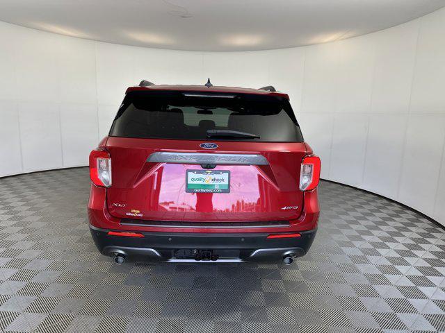 Photo of 2022 Rapid Red Metallic Tinted Clearcoat Ford Explorer