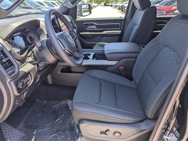 Photo of 2025 Diamond Black Crystal Pearlcoat RAM 1500