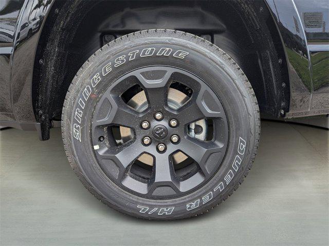 Photo of 2025 Diamond Black Crystal Pearlcoat RAM 1500