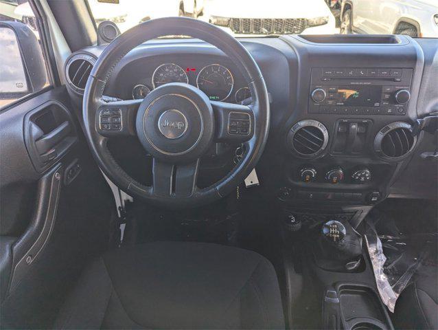 Photo of 2014 Bright White Clearcoat Jeep Wrangler
