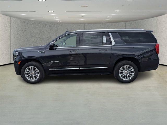 Photo of 2024 Titanium Rush Metallic GMC Yukon XL