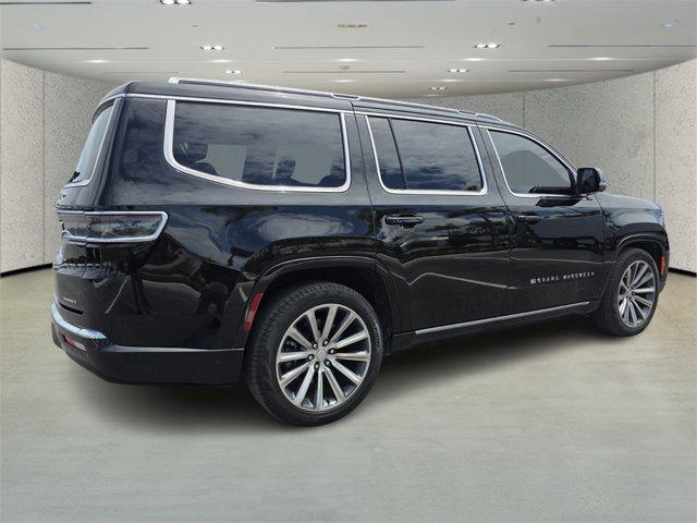 Photo of 2023 Diamond Black Crystal Pearlcoat Jeep Grand Wagoneer