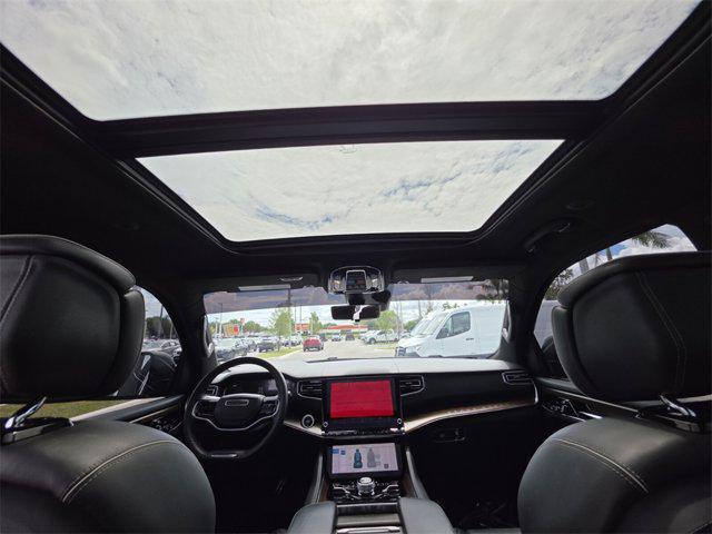 Photo of 2023 Diamond Black Crystal Pearlcoat Jeep Grand Wagoneer