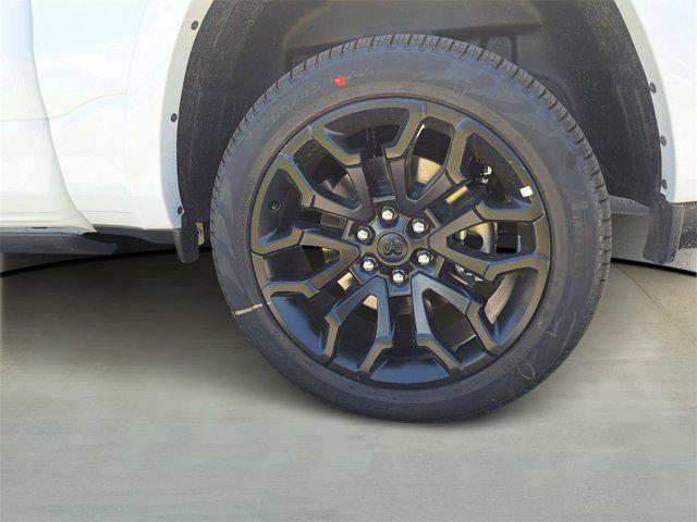 Photo of 2025 Ivory White Tri-Coat Pearlcoat RAM 1500