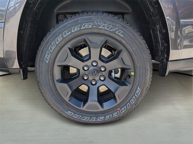 Photo of 2025 Granite Crystal Metallic Clearcoat RAM 1500