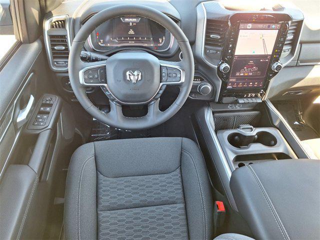 Photo of 2025 Hydro Blue Pearlcoat RAM 1500