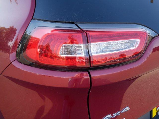 Photo of 2014 Deep Cherry Red Crystal Pearlcoat Jeep Cherokee