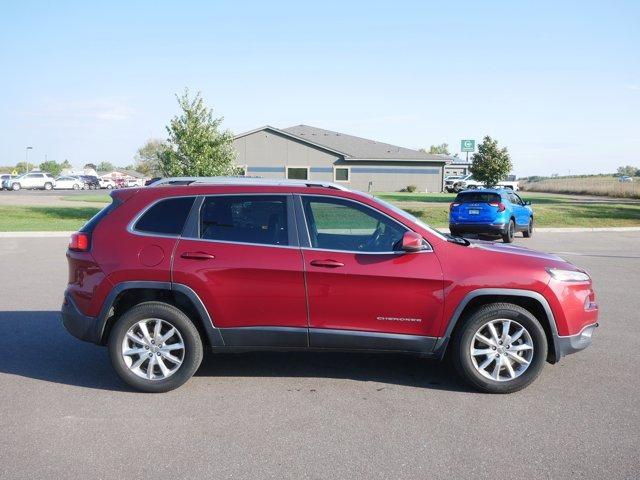 Photo of 2014 Deep Cherry Red Crystal Pearlcoat Jeep Cherokee