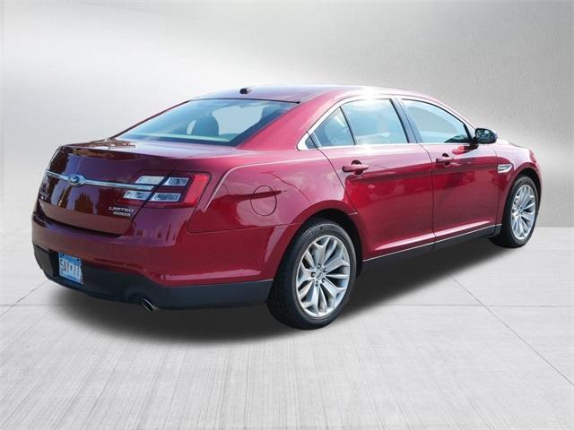 Photo of 2017 Ruby Red Metallic Tinted Clearcoat Ford Taurus