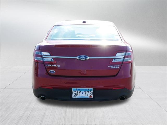 Photo of 2017 Ruby Red Metallic Tinted Clearcoat Ford Taurus