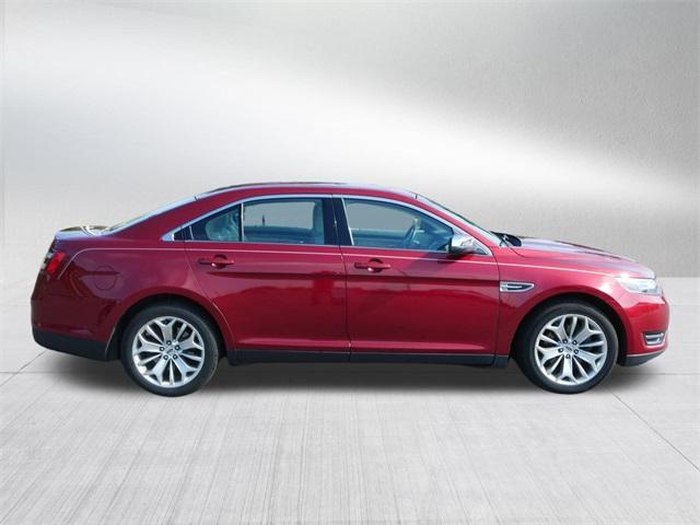 Photo of 2017 Ruby Red Metallic Tinted Clearcoat Ford Taurus