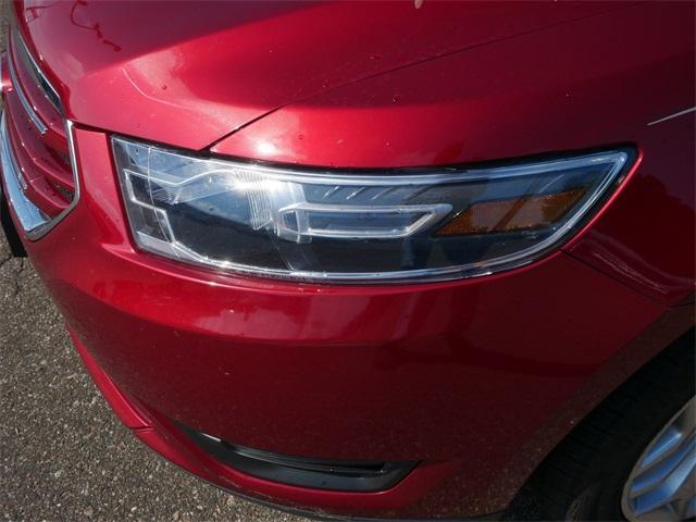 Photo of 2017 Ruby Red Metallic Tinted Clearcoat Ford Taurus